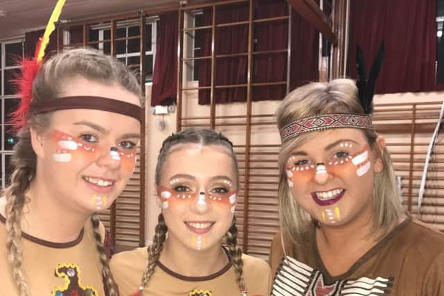 Geronimo! Glarryford YFC members Emma Johnston, Nicole Wray and Catti Armstrong ready to perform.