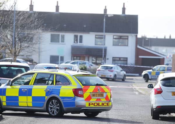 Police at the scene on Pinewood Avenue in Carrickfergus where a 44-year-old man was shot yesterday afternoon.