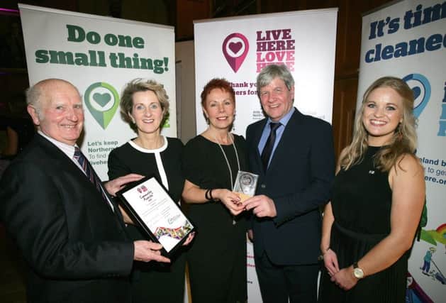 Members of Tidy Randalstown accept the Antrim and Newtownabbey Litter Heroes Award on behalf of Teresa Duffy, Tidy Randalstown, with Joe Mahon and Live Here Love Here Manager, Jodie- Ann McAneaney.