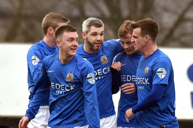 Glenavon's David Elbert
celebrates after scoring to make it 1-0
during Saturday's win over Dungannon. 
Photo by TONY HENDRON/Presseye.com.