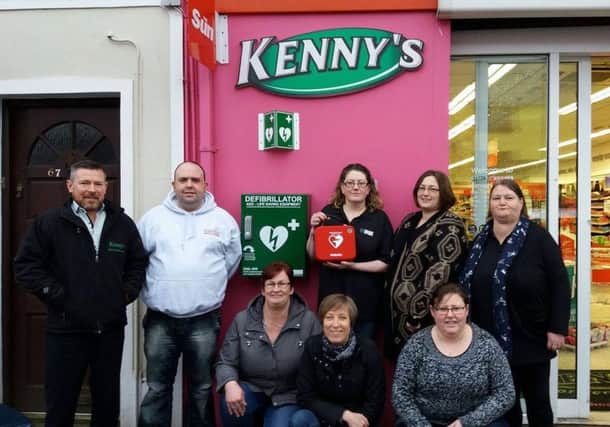 Garvagh Women's Network, with the support of the community, has provided two community defibrillators.  Pictured are, front row from left, Frances Mullan, Clare Armour, secretary, and Moyra Sloan of Garvagh Women's Network;  back,  Kenny Bradley of Kenny's Spar and Eurospar, Tyrone Smyth of Oakleaf Training, Tracey Nevin, treasurer, Samantha Doherty, chair, and Yvonne Moody of Garvagh Women's Network. INCR 12-708-CON
