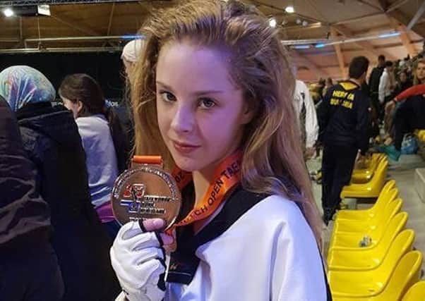 Maghaberry taekwondo girl Jodie McKew brought a silver medal home from the Dutch Open 2017 last week. The 12 year-old competed for Northern Ireland in Eindhoven and fought her way through four matches, successfully winning against many countries to reach the final. After an excellent final performance, she narrowly missed out on gold but earned a well-deserved silver medal. "To come to the Dutch Open for the first time, with 1,200 fighters from all corners of the world competing, and get into the final is a tremendous achievement," said Northern Ireland Team Coach, Bertie Nicholson.