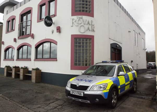 Police said CCTV footage captured the attack on the doorman at the Royal Oak pub in Carrickfergus