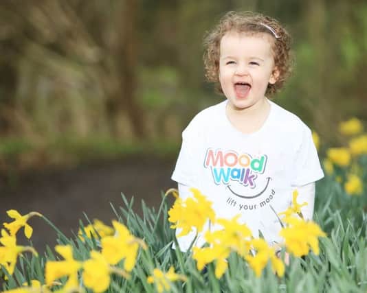 Sophie Meyer (aged 2) helping to launch the AWARE Mood Walks taking place in five areas throughout Northern Ireland.