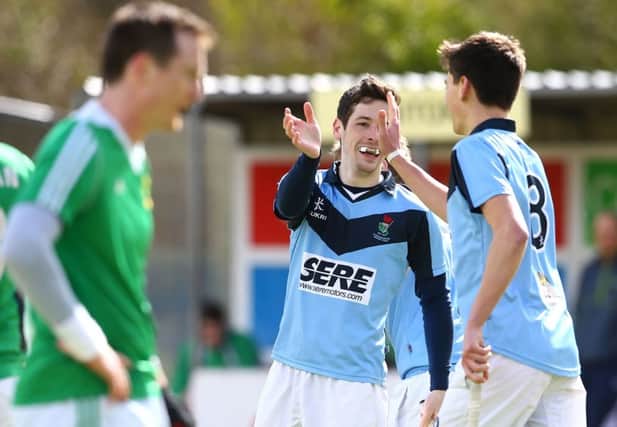 Lisnagarvey's Andy Forrest celebrates scoring against Glenanne last season at Comber Road. (Photo by William Cherry)