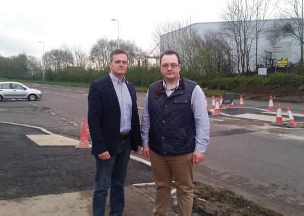 Robbie Butler MLA (left) with Cllr Alexander Redpath at the Knockmore Road/Ballinderry Road junction.