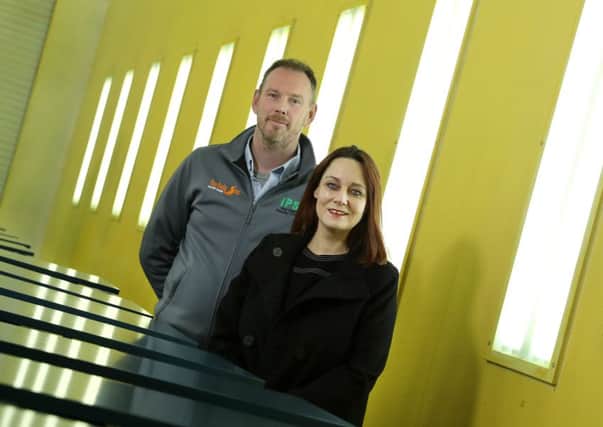 Pictured are Ellen Matthews, Business Banking Manager at Danske Bank and Richard Graham, Managing Director of Industrial Paint Solutions.