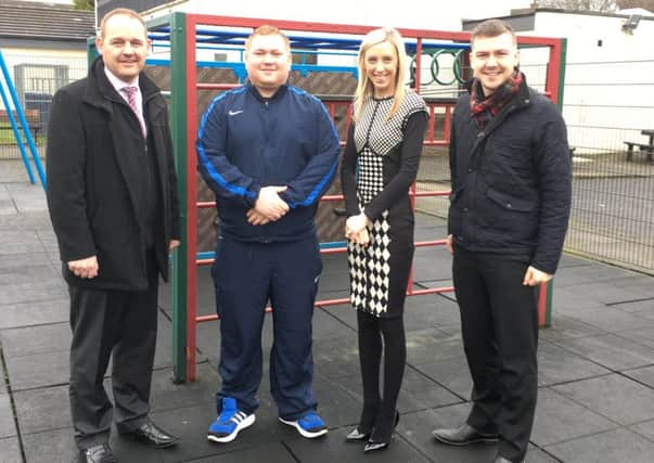 DUP's Councillors Terry McWilliams, Phil Moutray and colleague Carla Lockhart MLA with Chair of the Avenue Road Community Association