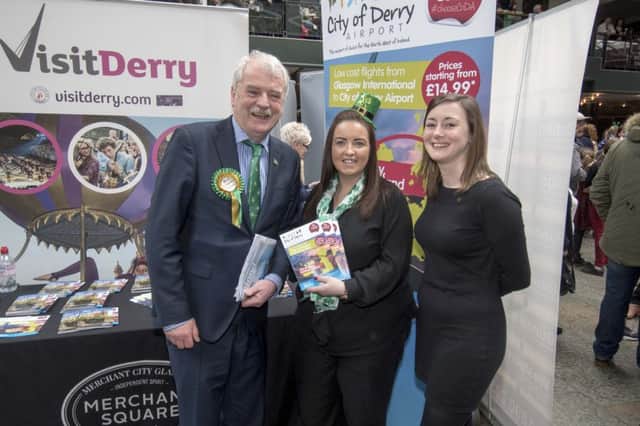 Pictured is Irish Minister of State, Finian McGrath; Charlene Shongo, City of Derry Airport; and Amy Riddell, Tourism Ireland, at the St Patrick's family event in Glasgow's Merchant Square.