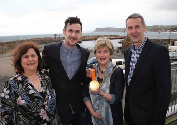 Paralympian Michael McKillop pictured with his parents Paddy and Cathryn and the Mayor of Causeway Coast and Glens Borough Council, Alderman Maura Hickey. PICTURE KEVIN MCAULEY/MCAULEY MULTIMEDIA/CCGBC