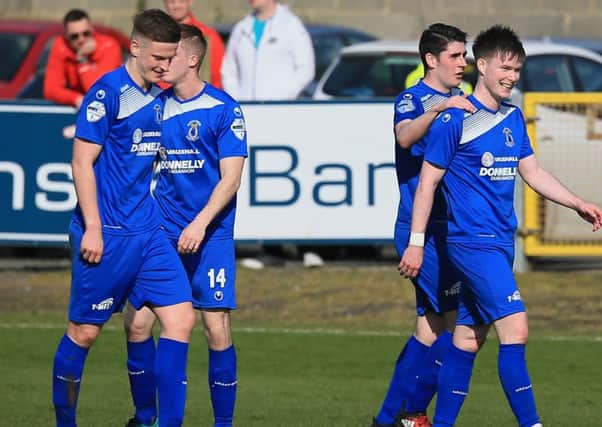 Peter McMahon (right) celebrating with team-mates following his goal against Portadown for Dungannon Swifts. Pic by Pacemaker.