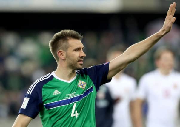 Northern Ireland's Gareth McAuley celebrates after defeating Norway 2-0 during Sunday's 2018 FIFA World Cup qualifier