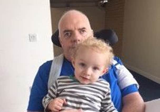Stroke survivor Alastair and grandson, Lucas. (Submitted Picture).