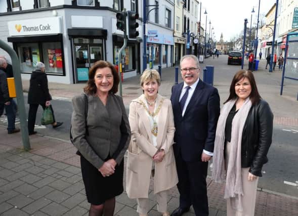 The Mayor of Causeway Coast and Glens Borough Council, Alderman Maura Hickey with Revitalise Project officer Jan O'"Neill, Town and Village manager Julienne Elliott and the chair of Coleraine Town Team, Ian Donaghey, on Kingsgate Street, which has benefitted from the Revitalise programme. INCR 14-755-CON PICTURE KEVIN MCAULEY/MCAULEY MULTIMEDIA/CCGBC