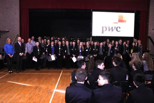 Dominican College students pictrured at the Northern Regional Colleges Bring IT On event, funded by the Department for the Economy, to discover insights into new opportunities for pupils who aspire to follow a career in ICT and Science, Technology, Engineering and Maths (STEM).