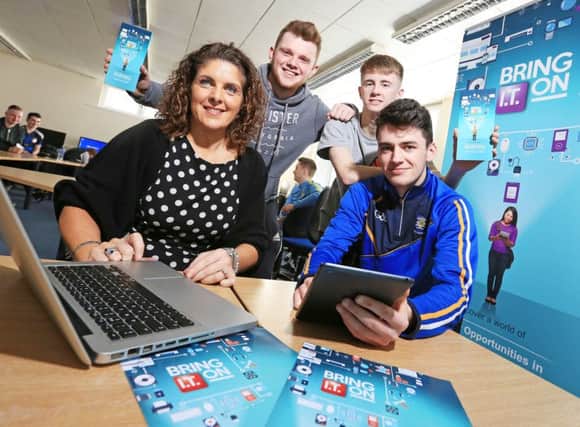 Limavady students Stephen Nelis, James Scott and Hugh O'Connell with Joanne Sweeney from Sentinus JC17.