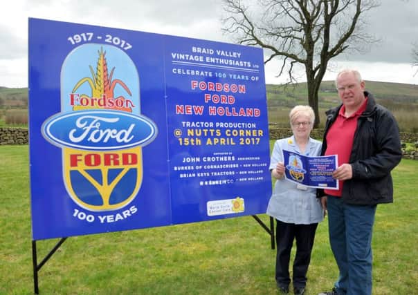 John Crothers, chairman, Braid Valley Vintage Enthusiasts Ltd, with Muriel Adair from Marie Curie, prepare for the Big 100 event on April 15, 2017.
