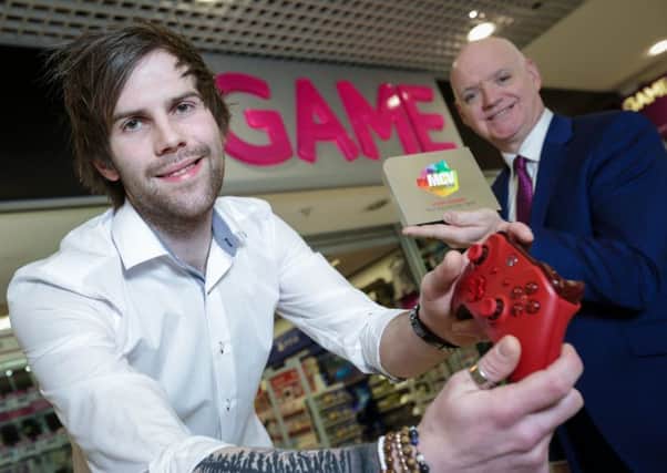 Paul Mulholland has proved himself to be at the top of his game after scooping the UK Manager of the Year Award 2017 at the prestigious MCV Awards in London for his manager role at GAME, beating hundreds of other hopefuls from across the country for the top title. After almost a decade at GAME, which is based at Rushmere Shopping Centre, Paul worked his way through the ranks to become the storeÃ¢Â¬"s manager more than three years ago. Under PaulÃ¢Â¬"s direction, his Rushmere-based store also finished among the Top 3 in the UK for virtual reality demonstrations among more than 300 stores. Paul is pictured with Martin Walsh, Centre Manager at Rushmere Shopping Centre.