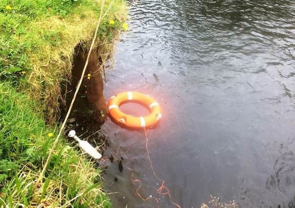 The life ring was thrown into the Six Mile Water.