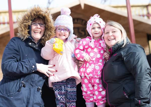 Marianne Johnston (left) with her daughter Lucy Ellen and Catherine Snijder (right) with her daughter Abigail enjoying the special activity weekend at Todds Leap organised by Childrens Liver Disease Foundation. Pic by John O'Neill