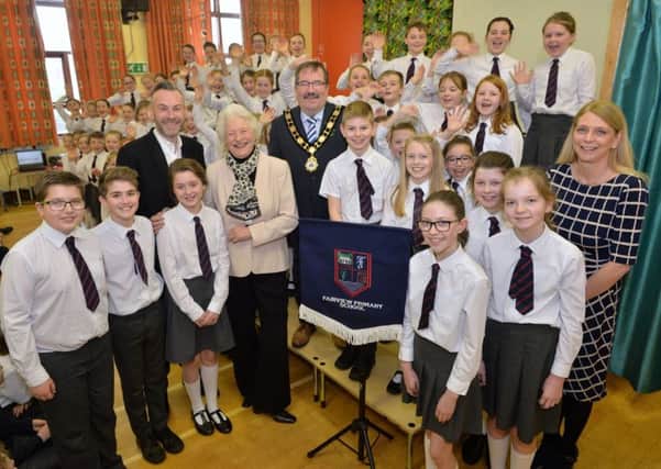 Dame Mary Peters meets children from Fairview Primary School in Ballycastle who are going to be taking part in the 'Go The Distance' concert in the Theatre at the Mill on the 6th and 7th April in aid of the Mary Peters Trust.
Also pictured are musical director Ashley Fulton, Mayor of Antrim and Newtownabbey Borough Council Ald John Scott and Fairview Principal Paula Matthews.
After the success of 'Go The Distance' last year in Lisburn Theatre at the Mill are hosting 'Round 2' od this musical extravaganza, where the worlds of sport and music collide.
Photo by Aaron McCracken/Harrisons