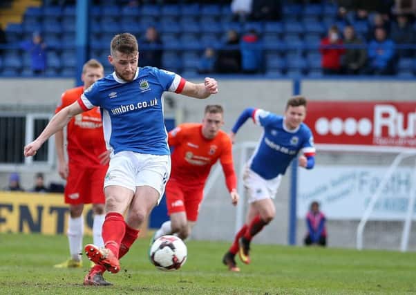 Stephen Lowry's afternoon featured a penalty miss but winning goal to send Linfield into the Irish Cup final despite a spirited performance by Dungannon Swifts. Pic by PressEye Ltd.