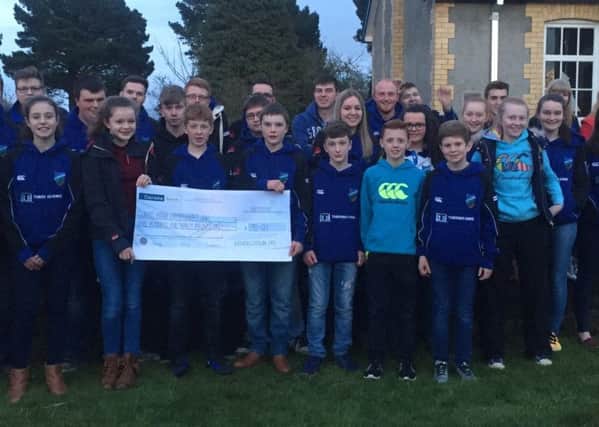 Randalstown YFC presented a cheque for Â£590 to Laurel House Chemotherapy unit which waS collected at the annual church service last month.