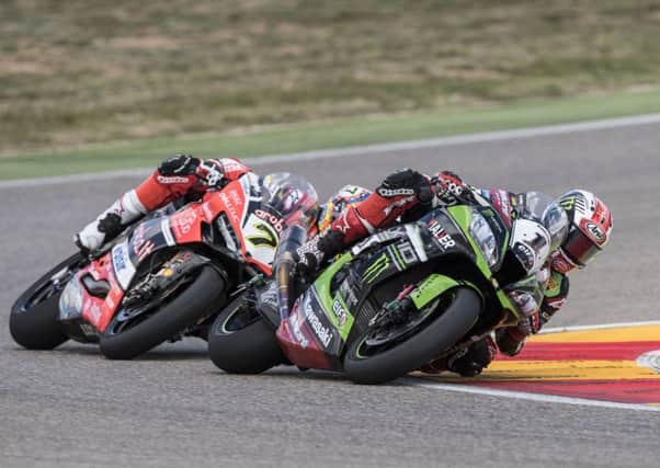 Jonathan Rea (Kawasaki) leads Chaz Davies (Ducati) at Aragon in Spain.