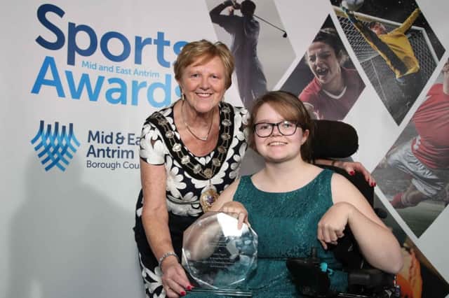 Claire Taggart with her Special Recognition Award and Mid and East Antrim Borough Mayor Councillor Audrey Wales. Picture by Darren Kidd / Press Eye