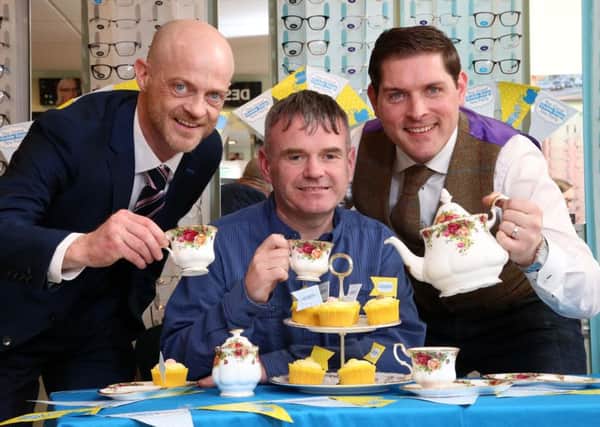 The Great Guide Dogs Tea Parties were launched by Gary Loughran and his guide dog Usher, Specsavers NI chair Brian OKane along with local singer and songwriter Malachi Cush who is supporting Guide Dogs NI as a Tea Party ambassador. - Picture by Darren Kidd / Press Eye.