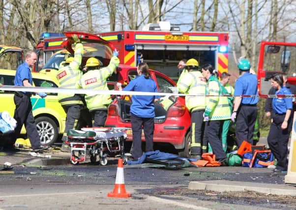 Road safety issue has been rumbling on for years: This archive picture from 2008 shows emergency services personnel attending a serious RTC on Knockmore Road.