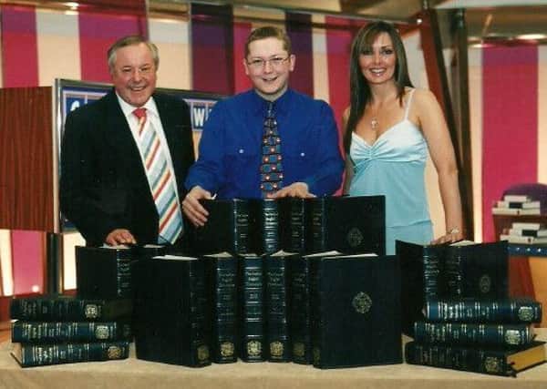 Stewart Holden pictured with Countdown host Richard Whiteley and Carol Vorderman after he was crowned champion in 2004.