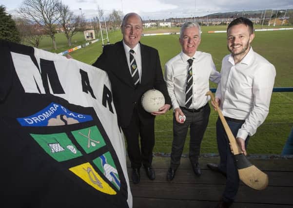 Declan McCann and Declan McCarney of Dromara GAC with Ulster Unionist MLA Robbie Butler (right).