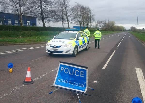 A police cordon on Finvoy Road, Ballymoney following today's fatal crash