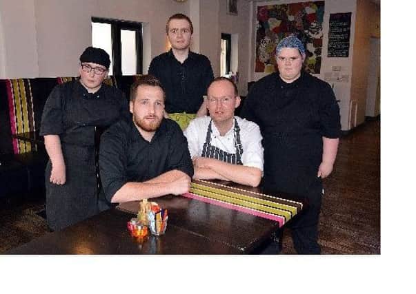 Staff and trainees at 180 Restaurant pictured in March last year  when the restaurant was in danger of closing.