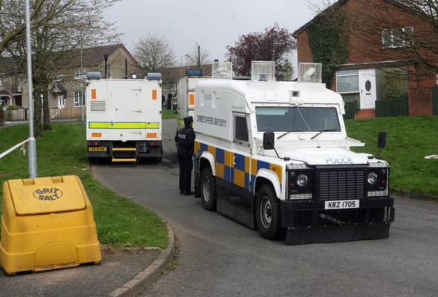Police  carried out a number of controlled explosions on a suspect vehicle as part of a security alert in Azalea Gardens, Dunmurry.  Photo by Freddie Parkinson / Press Eye