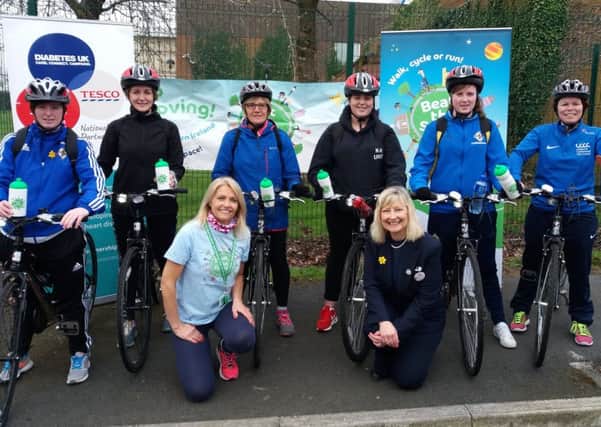 Participants Laura Smith, Mable Scullion, Alison Bird, Jade Aughey, Emma McNeill with Dawn Millar Women and Girls Activity Leader, Lisburn and Castlereagh City Council. Front row L-R Dianne Whyte, Engagement Manager Beat the Street and Ann Broome, Tesco Community Champion Lisburn Store