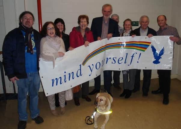 Tim McGarry with members of Mind Yourself! at the Millenium Forum.