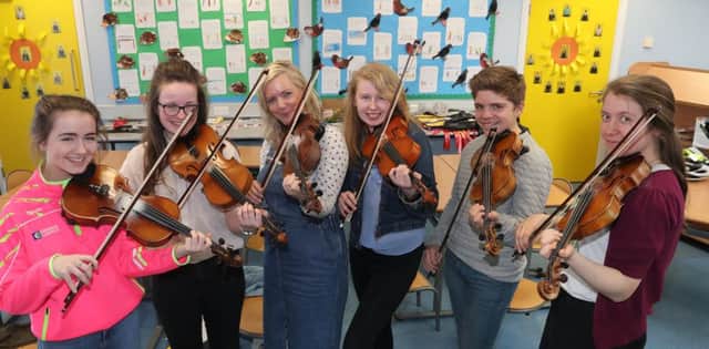 Advanced fiddle tutor Teresa Clarke with students  at the John Kennedy Weekend in Ballycastle