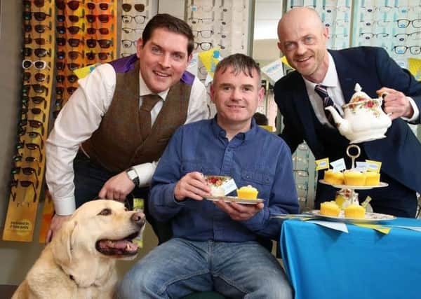 Launching the first Great Guide Dogs Tea Party from left, singer/songwriter Malachi Cush, Gary Loughran with his guide dog Usher and Brian OKane, NI Chair of Specsavers.