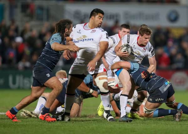 Andrew Trimble is tackled by Josh Navidi during the Guinness PRO12 League clash between Ulster Rugby and Cardiff Blues