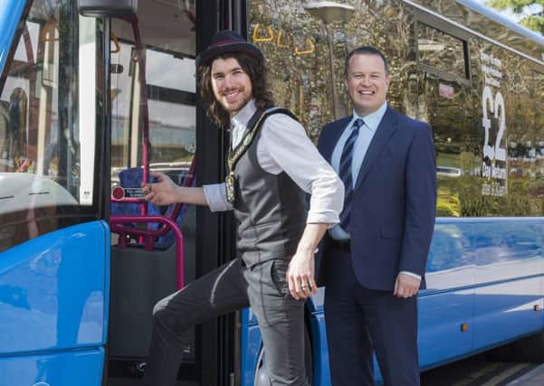 Mayor of Armagh, Banbridge and Craigavon, Cllr Garath Keating and Gary Mawhinney, Translink service delivery manager.