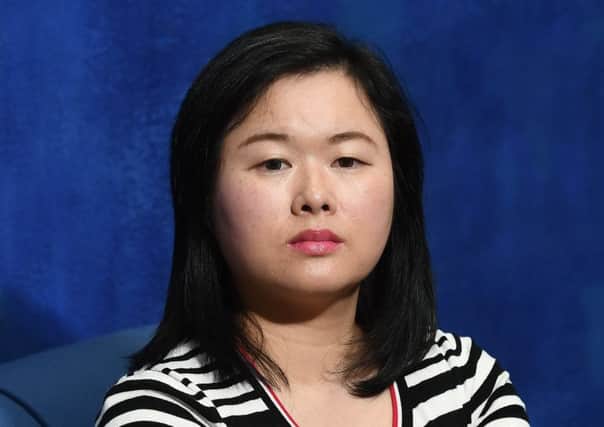 Jing-Yueh Huang-Porterfield felt she had no option but to resign