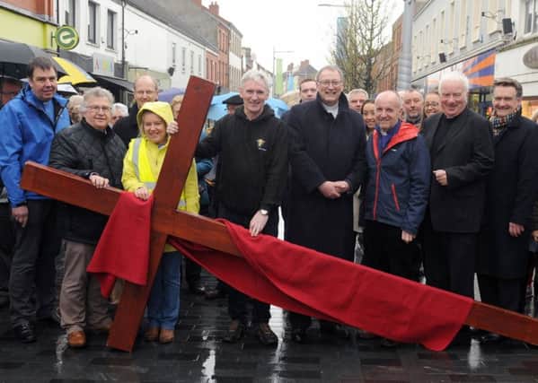 Lisburn City Centre Clergy pictured prior to the Good Friday carrying of the cross walk of witness in Lisburn.  L to R:  Rev David Turtle (Trinity Methodist), Rev Mervyn Ewing (Seymour Street Methodist), Rev Dr Allen Sleith (Hillsborough Presbyterian Church), Rev Denise Acheson (Lisburn Cathedral Assistant Minister), Very Rev Sam Wright (Lisburn Cathedral), Rt Rev Dr Frank Sellar (Moderator of the General Assembly), Rt Rev Alan Abernethy (Bishop of Connor), Father Dermot McCaughan (St Patricks) and Rev John Brackenridge (First Lisburn Presbyterian).