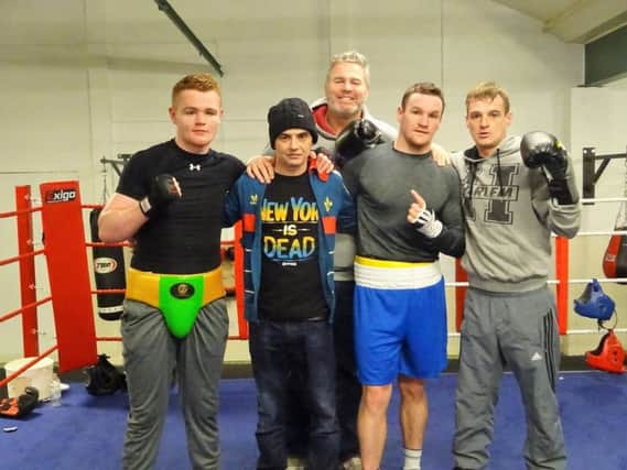 Former world cruiserweight champion, Glenn McCrory pictured at Oak Leaf ABC recently with local boxers, Sean McGlinchey and Brett McGinty who have been sparring ahead of McGlinchey's pro debut.