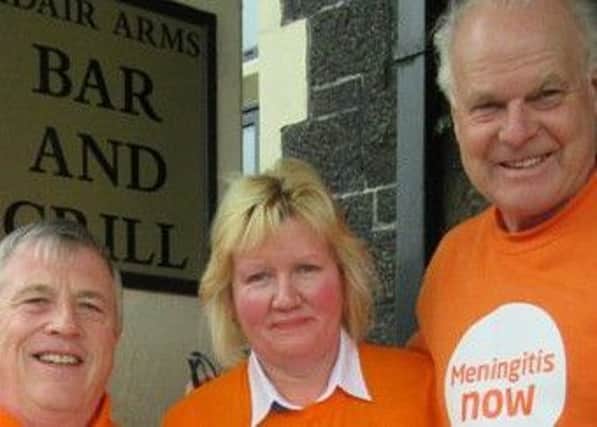 Sylvia Dunlop with charity campaigner Steve Dayman (right), and Meningitis Now NI Community Ambassador Carl Monteith.