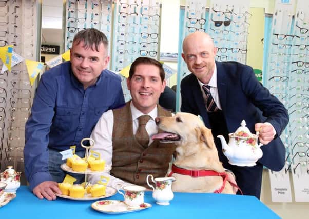 Pictured launching the Guide Dogs Tea Party are (from left) Gary Loughran, Guide Dogs NI, singer/songwriter Malachi Cush with his pet labrador Molly and Brian OKane, Specsavers NI Chair.