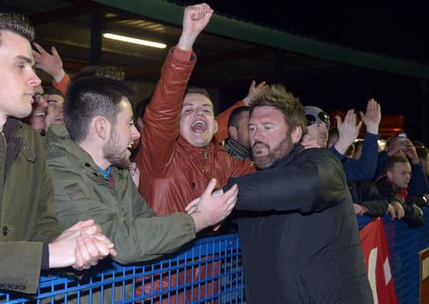 Portadown manager Niall Currie showing his appreciation to the supporters after the final whistle on Tuesday. Pic by PressEye Ltd.