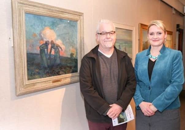 Councillor Liam Mackle and Catherine Giltrap of Trinity College Dublin at Armagh County Museum for the launch of a new exhibition with works of George 'AE' Russell.
