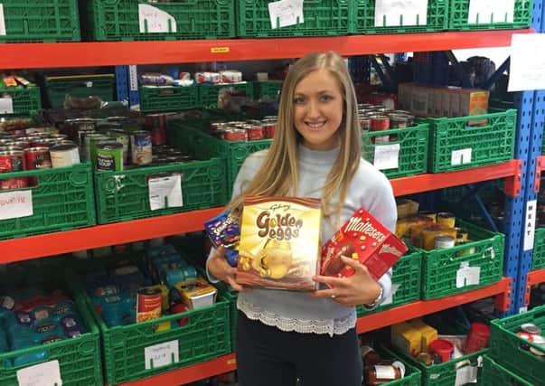 Foodbank co-ordinator Kathryn Millar with some of the easter eggs.
